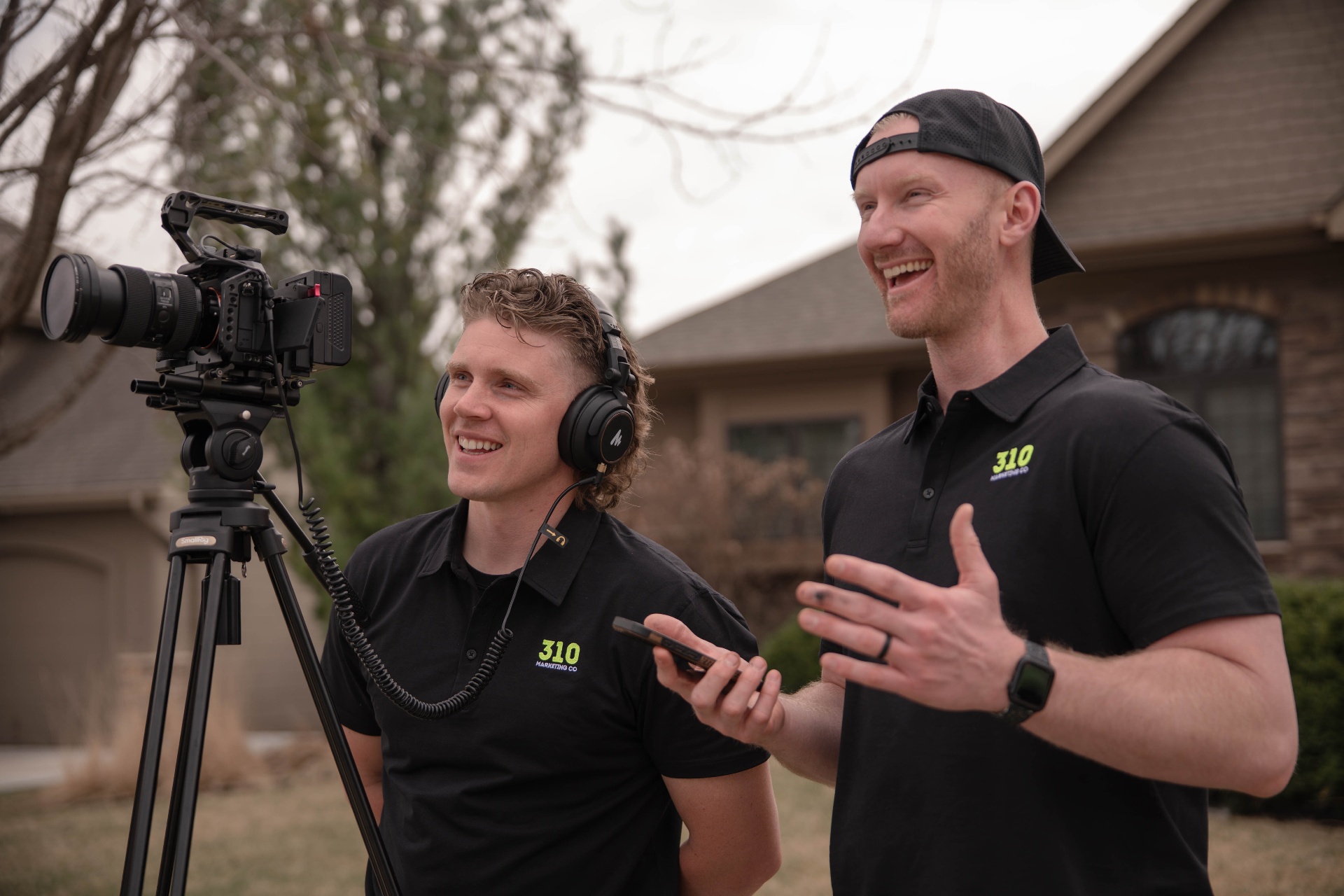 Landon and Zach, founders of 310 Marketing Co, filming on location for a client