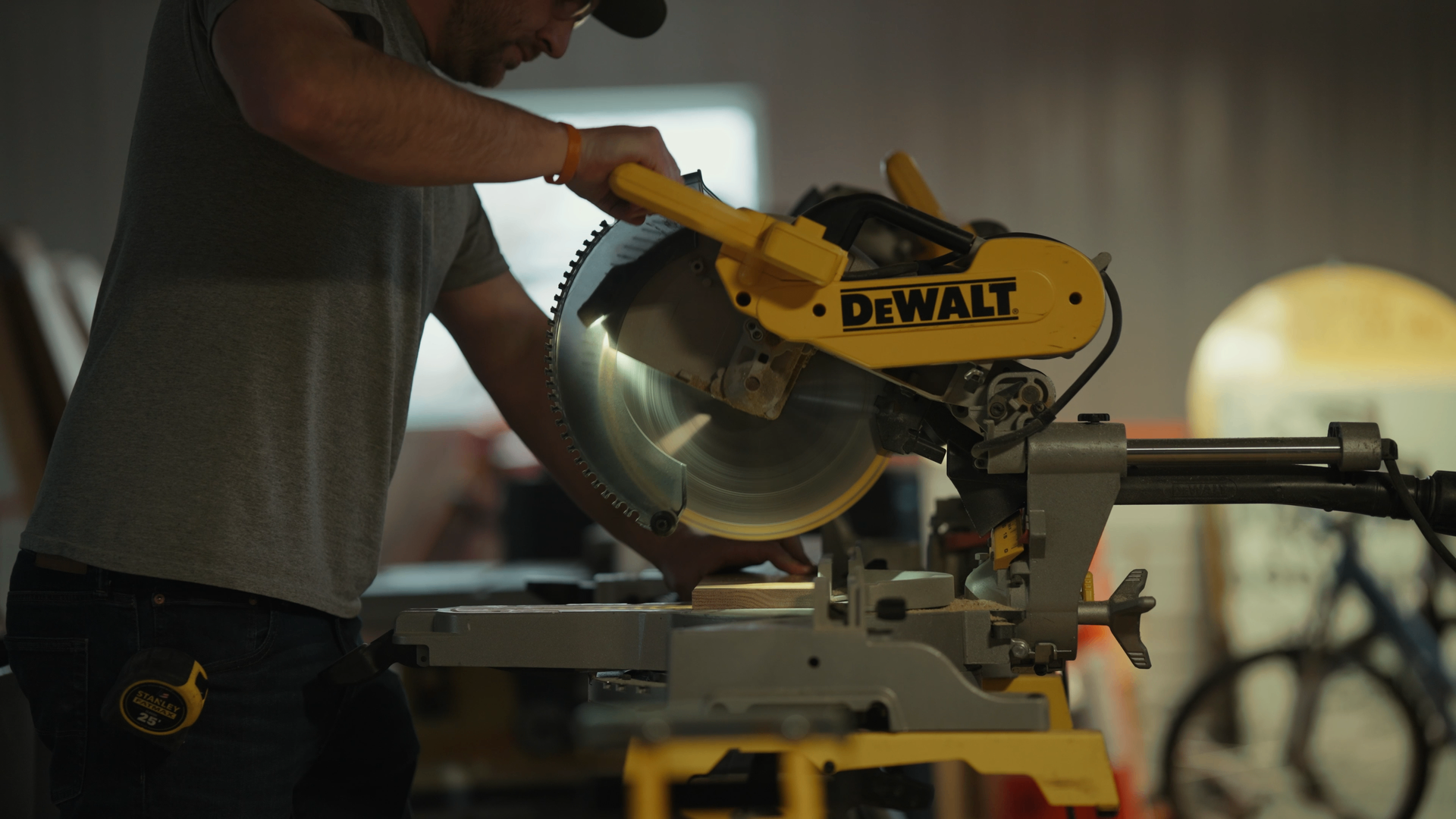 Contractor using a miter saw on a job site
